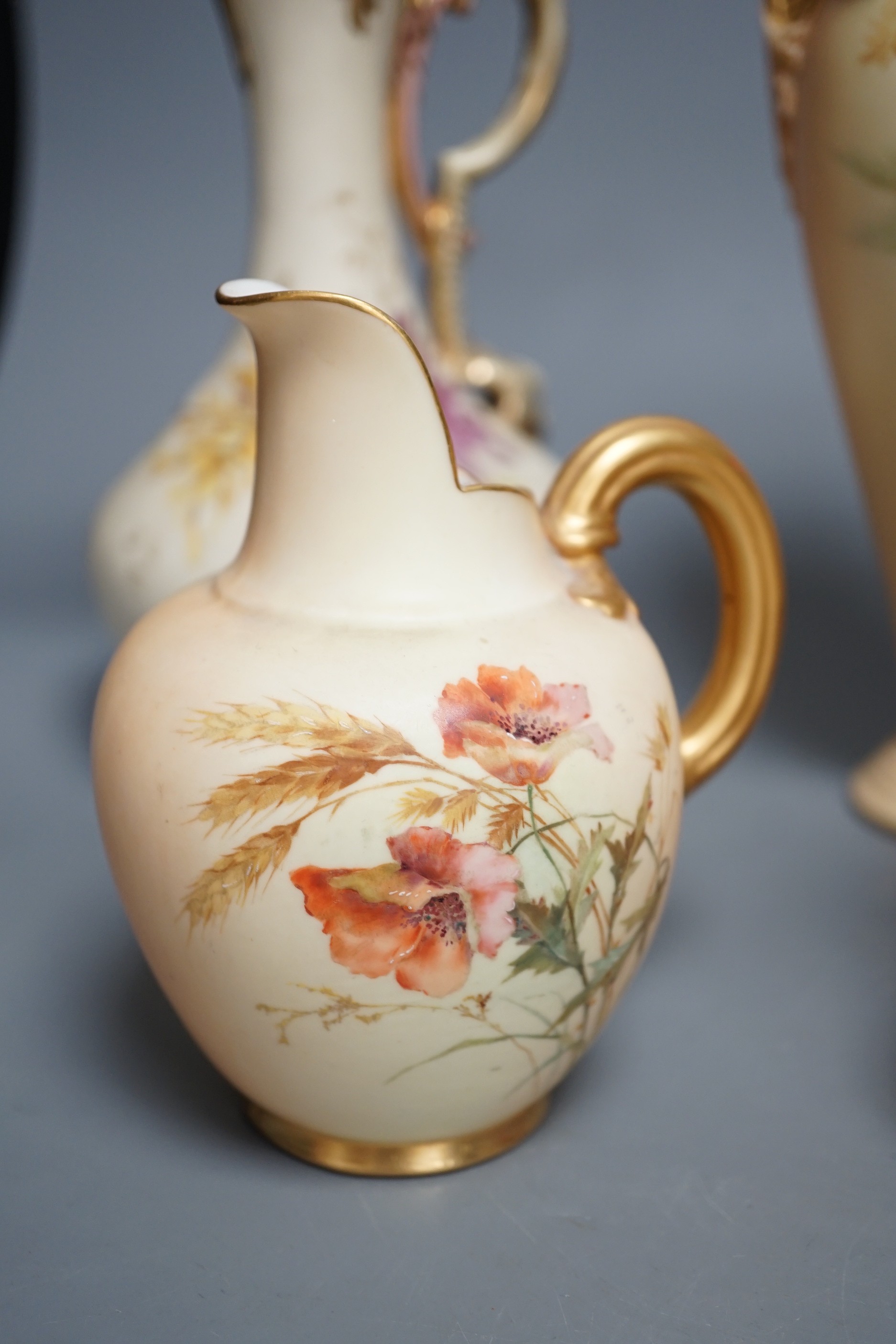 A Worcester blush ivory - a bottle vase and 3 jugs, tallest 27cms high